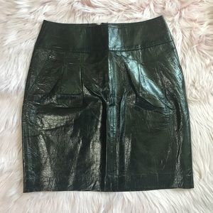 Black patent leather mini skirt with pockets